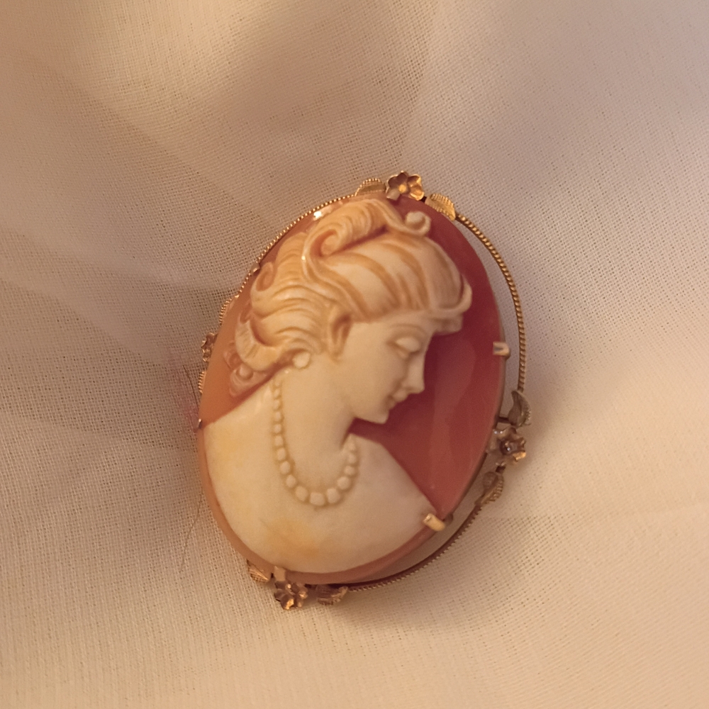 Elegant Gold and Cream Cameo Brooch